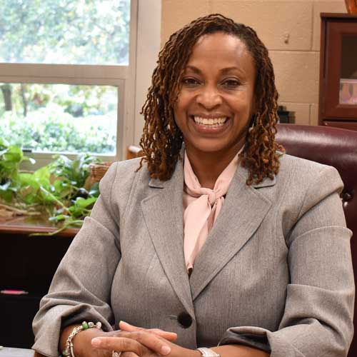 Principal Elder at her desk