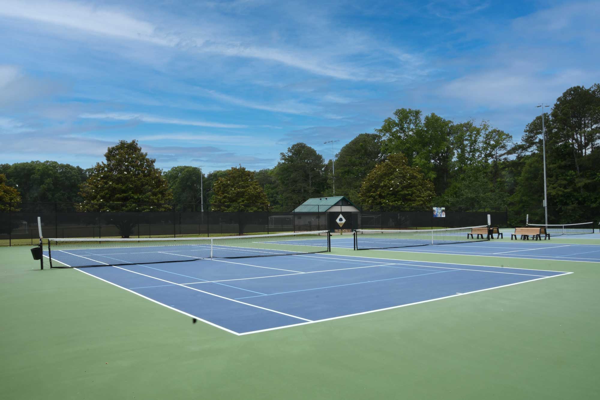 Beautiful tennis courts at Henderson park on a sunny day