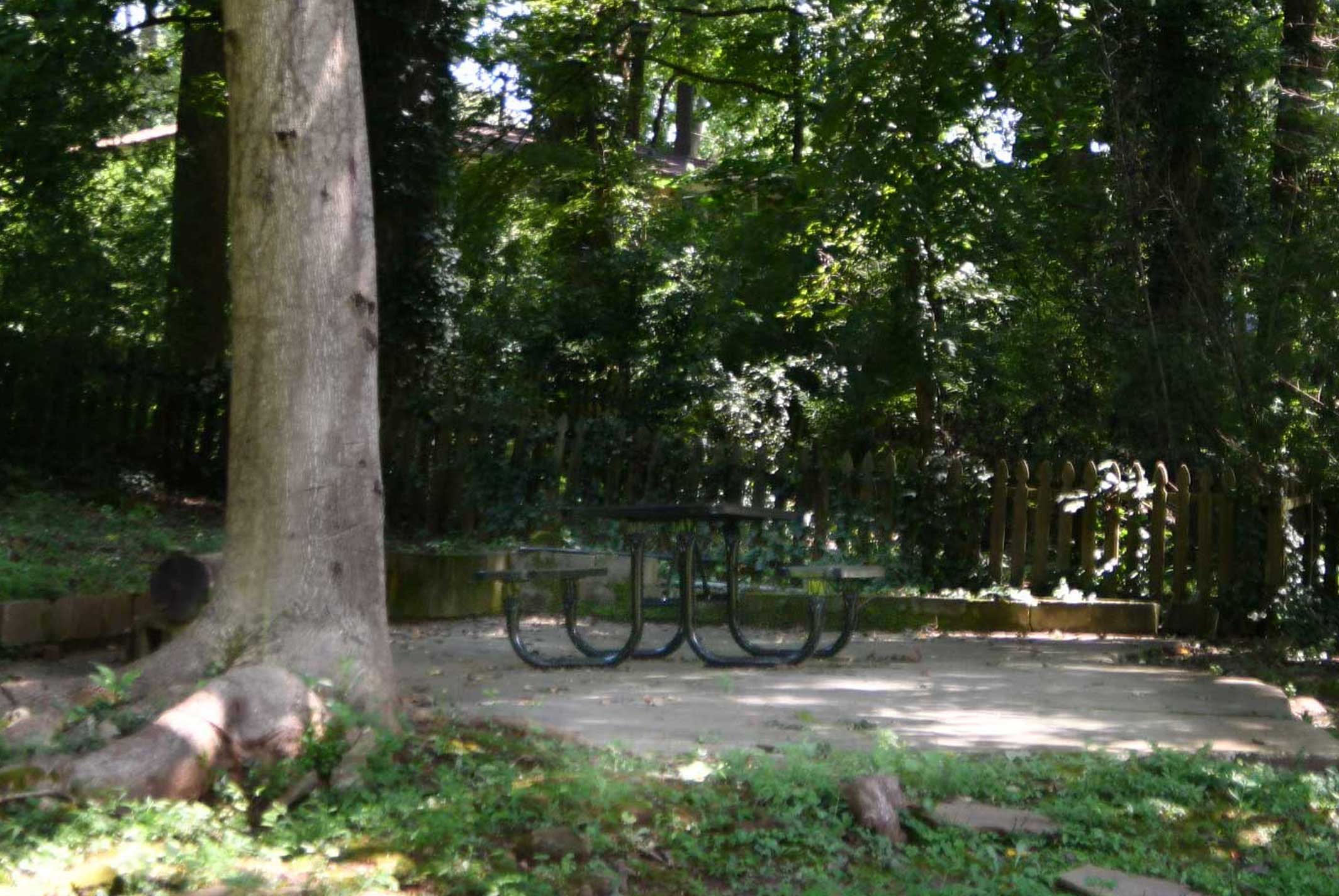 Comfortable picnic tables in shade at the Westwood Nature Preserve