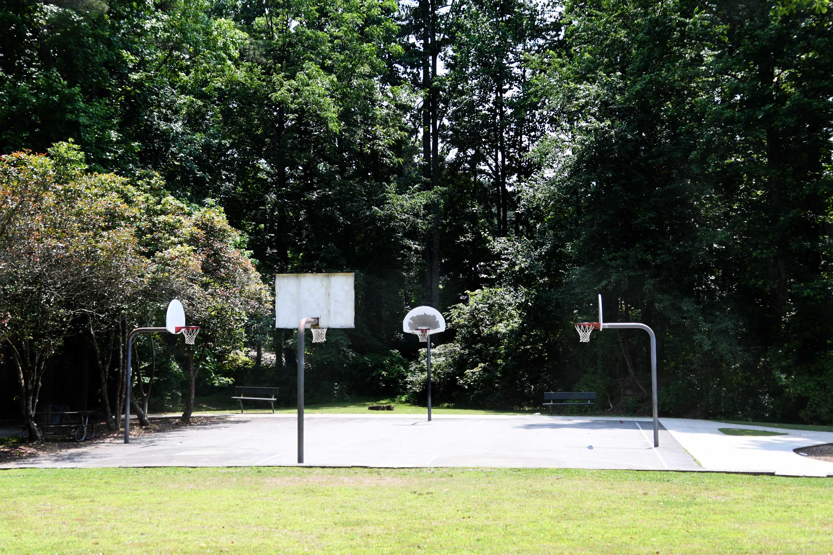 The basketball court at Peters Park on a sunny day