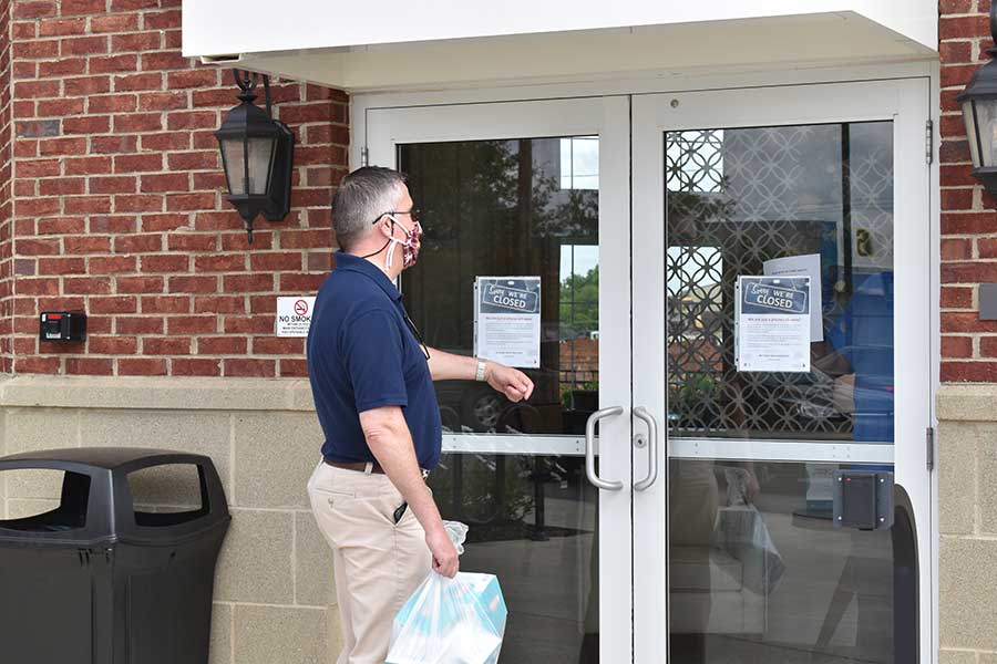 John McHenry reaching for business' double-doors