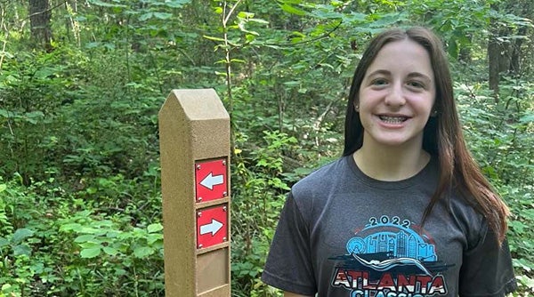 Abigail Heizer on a trail 