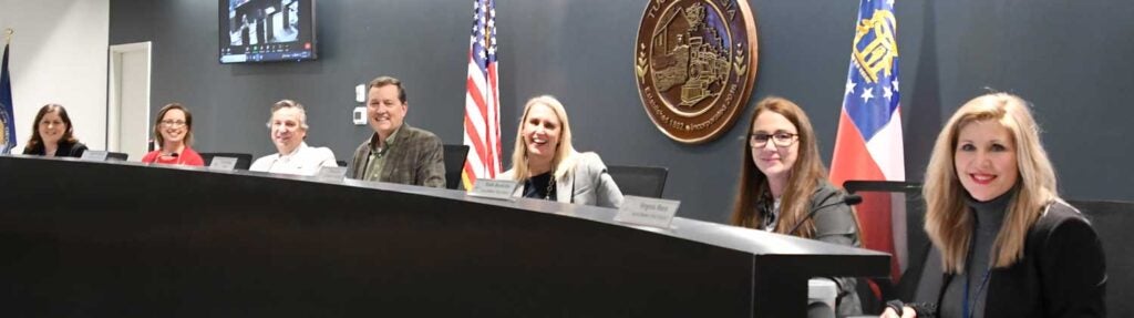 Smiling council members