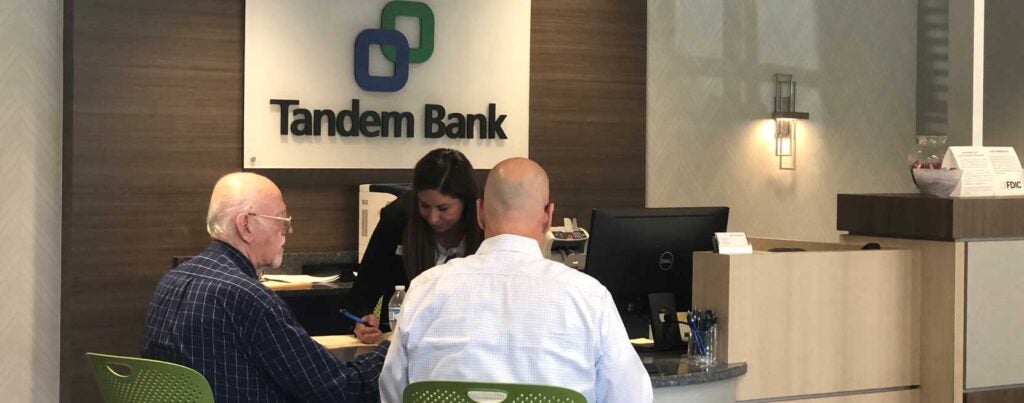 Customers at the Tandem bank in Tucker