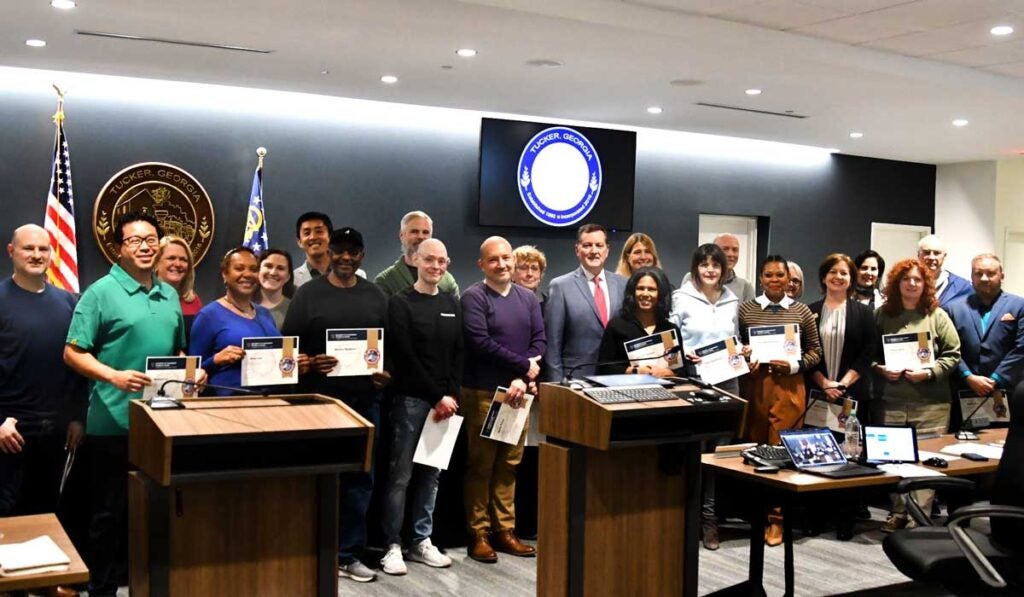 Mayor Auman with the 27 graduates of the University of Government Affairs Tucker’s Class of 2024.