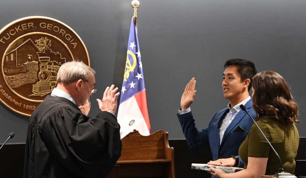 Newly elected Councilmember Vihn Nguyen is sworn in.