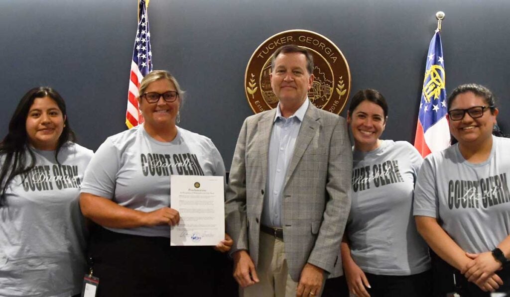 The clerks of Tucker Municipal Court with Mayor Frank Auman.