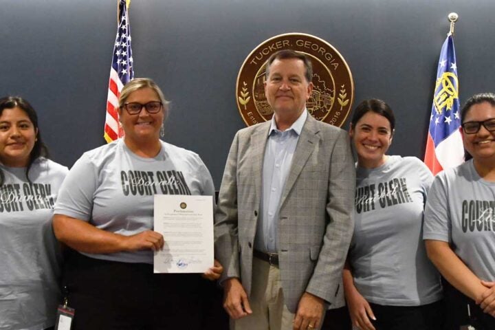 The clerks of Tucker Municipal Court with Mayor Frank Auman.