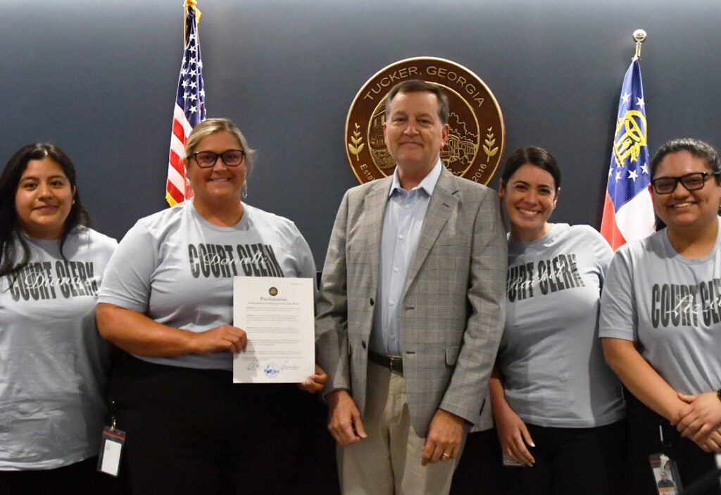 Mayor Auman presents a proclamation.