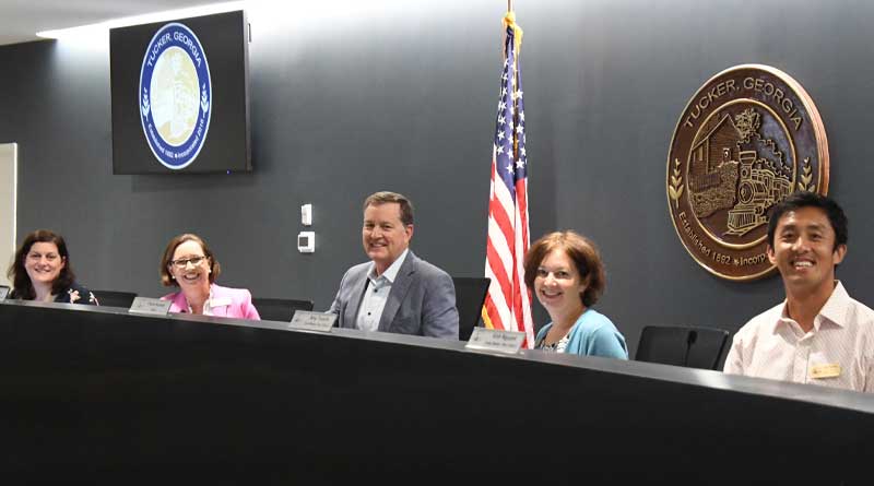 CIty Council smiling from the dias.