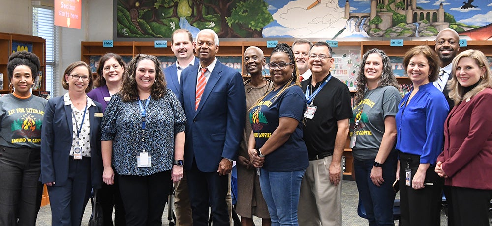 Congressman Hank Johnson poses with Tucker's Mayor and City Council, Karen Peters, City staff and Livsey staff.