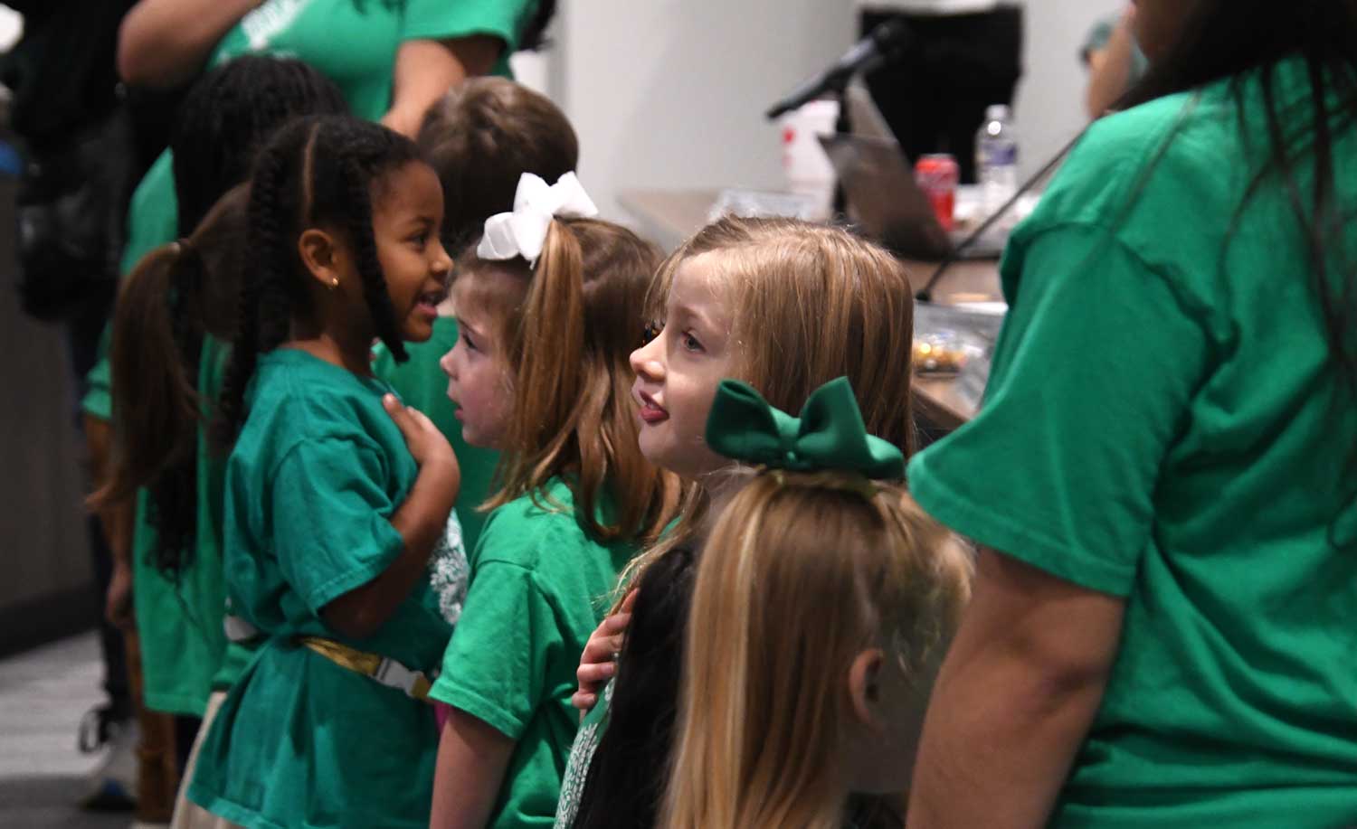 The preschool class of a local church led the pledge of allegiance.