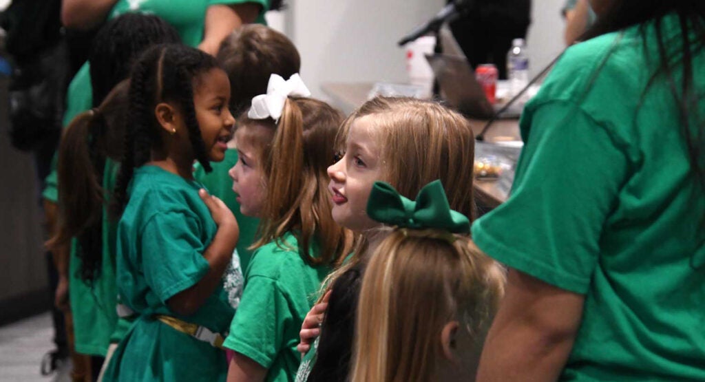 The preschool class of Tucker First United Methodist led the Pledge of Allegiance.