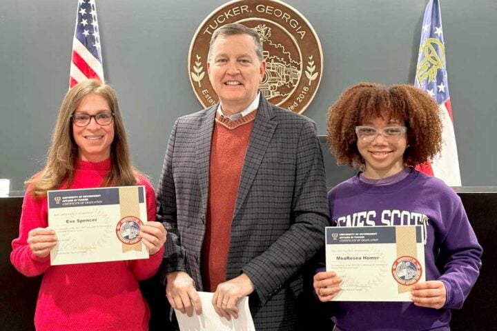 University of Government Affairs Tucker graduates.